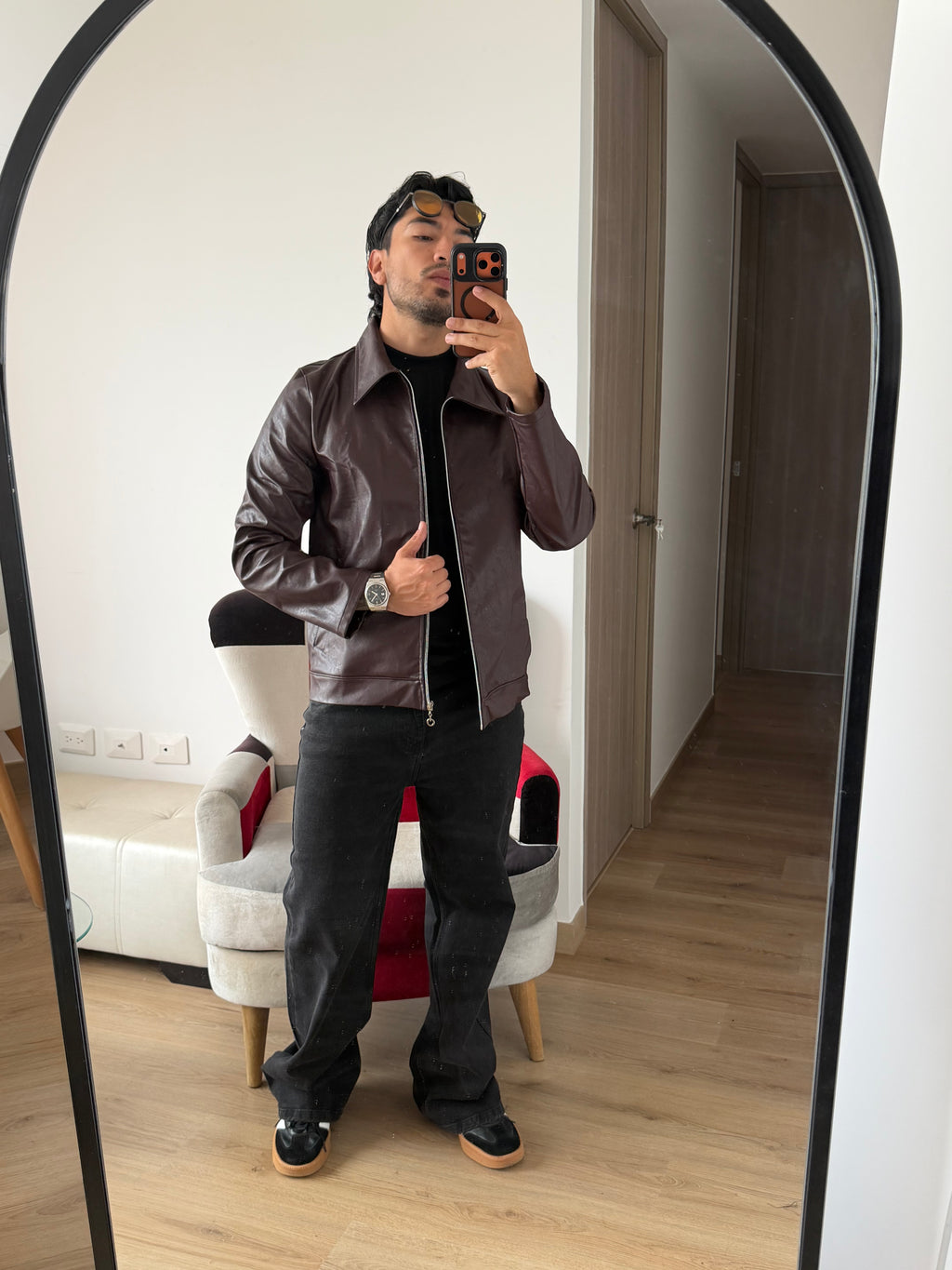 Chaqueta polo cuero text